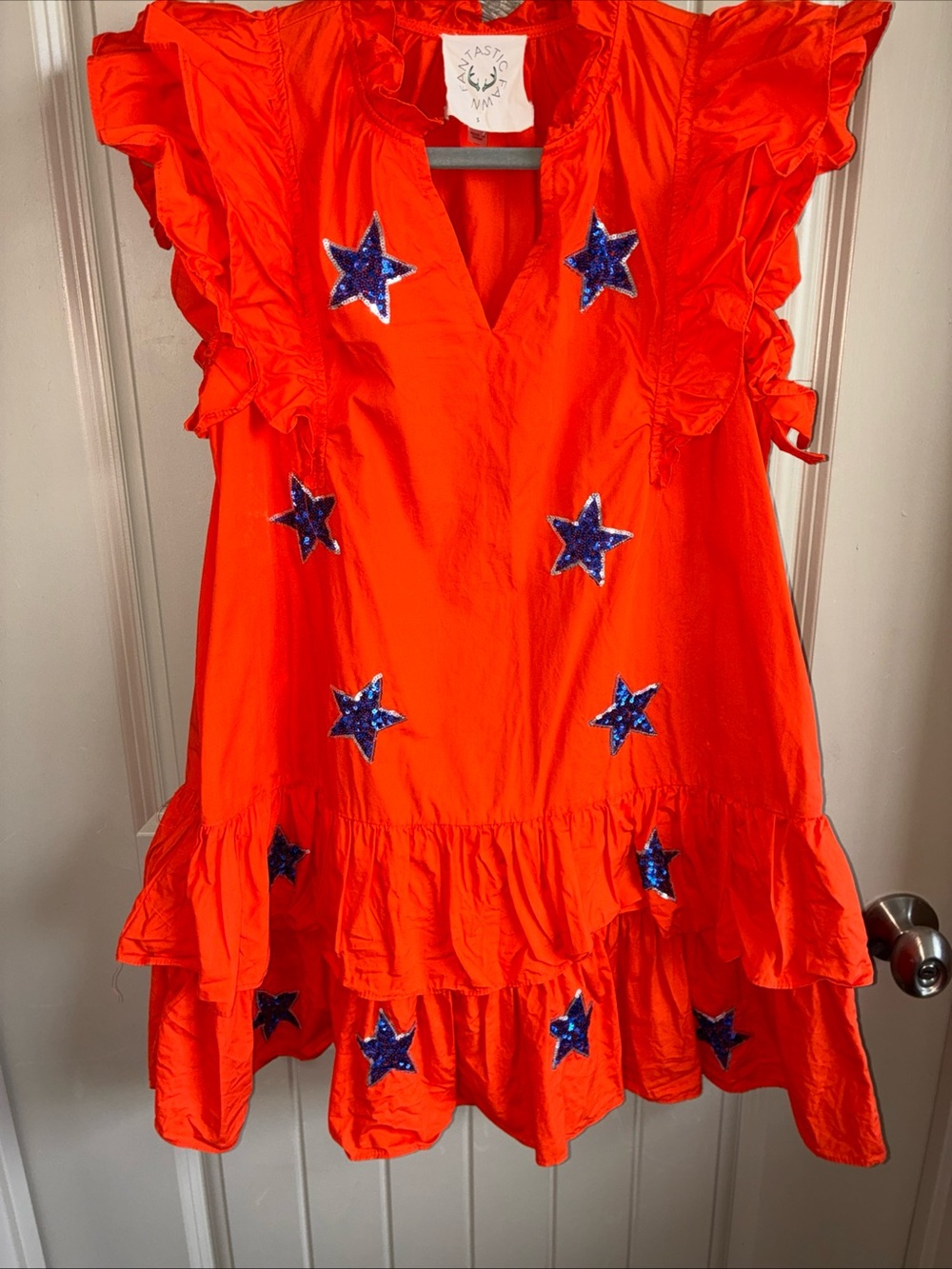 Fantastic Fawn Bright Orange Dress with Blue Star Appliqués